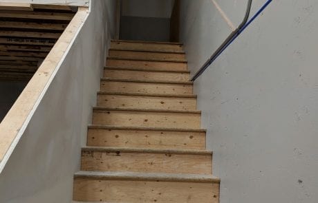 Tenant improvements at commercial bay, mezzanine stairs
